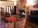 Sitting by Fireplace