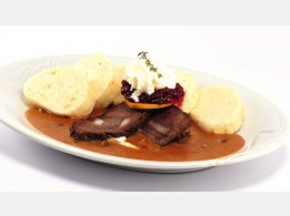 Marinated Beef in Cream Sauce with Cranberries and with Bread Dumplings