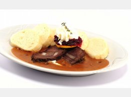 Marinated Beef in Cream Sauce with Cranberries and with Bread Dumplings
